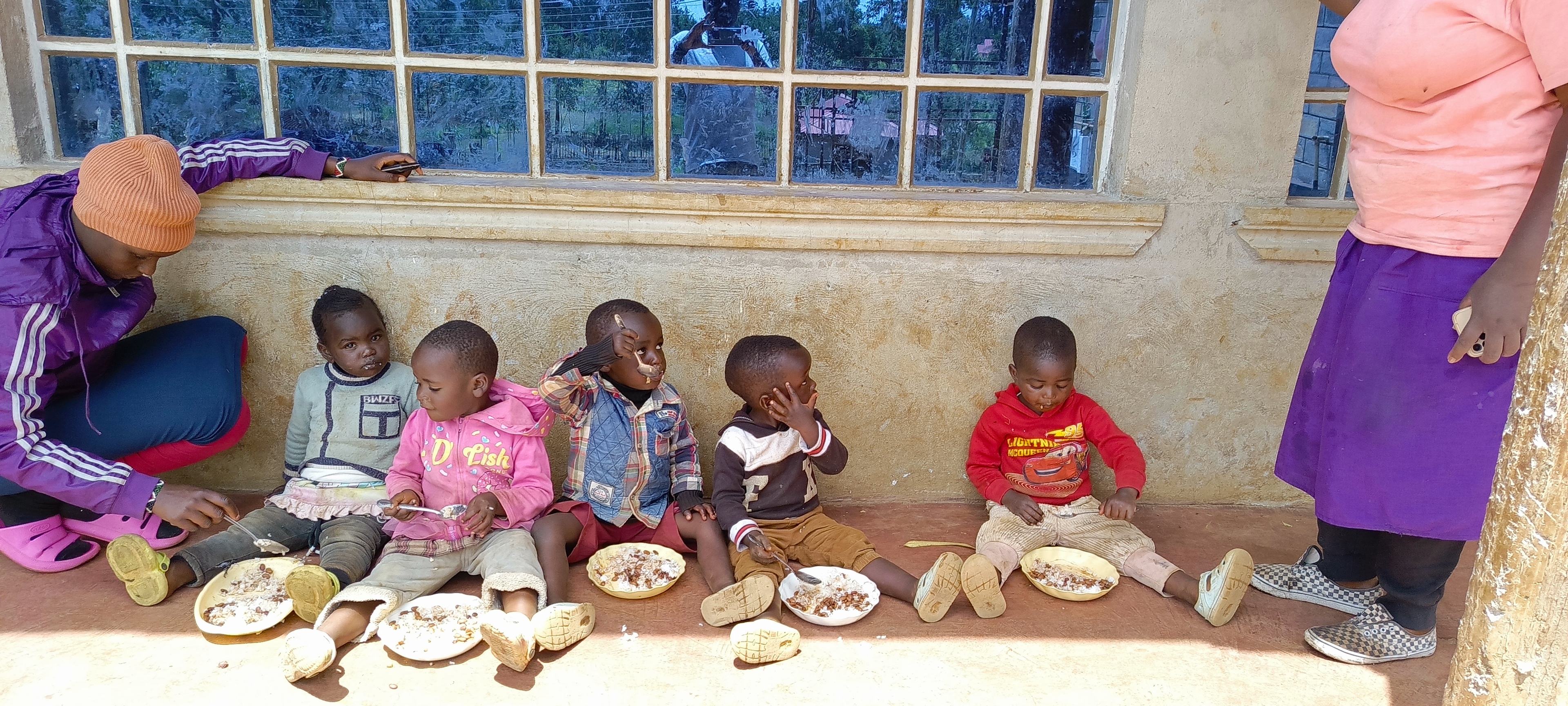 Babies eating lunch at Bethesda Child Care Centre