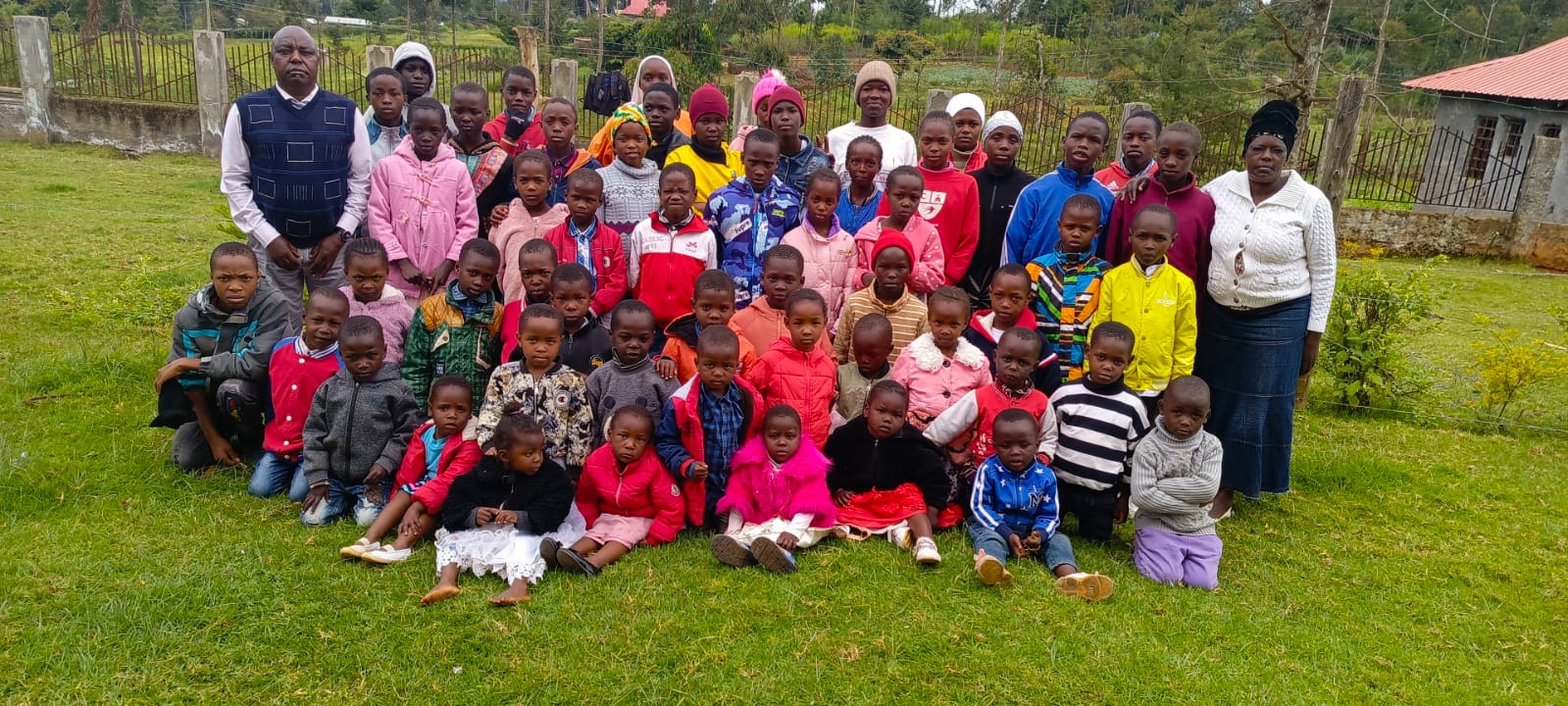 Group family photo of children and staff at Bethesda Child Care Centre