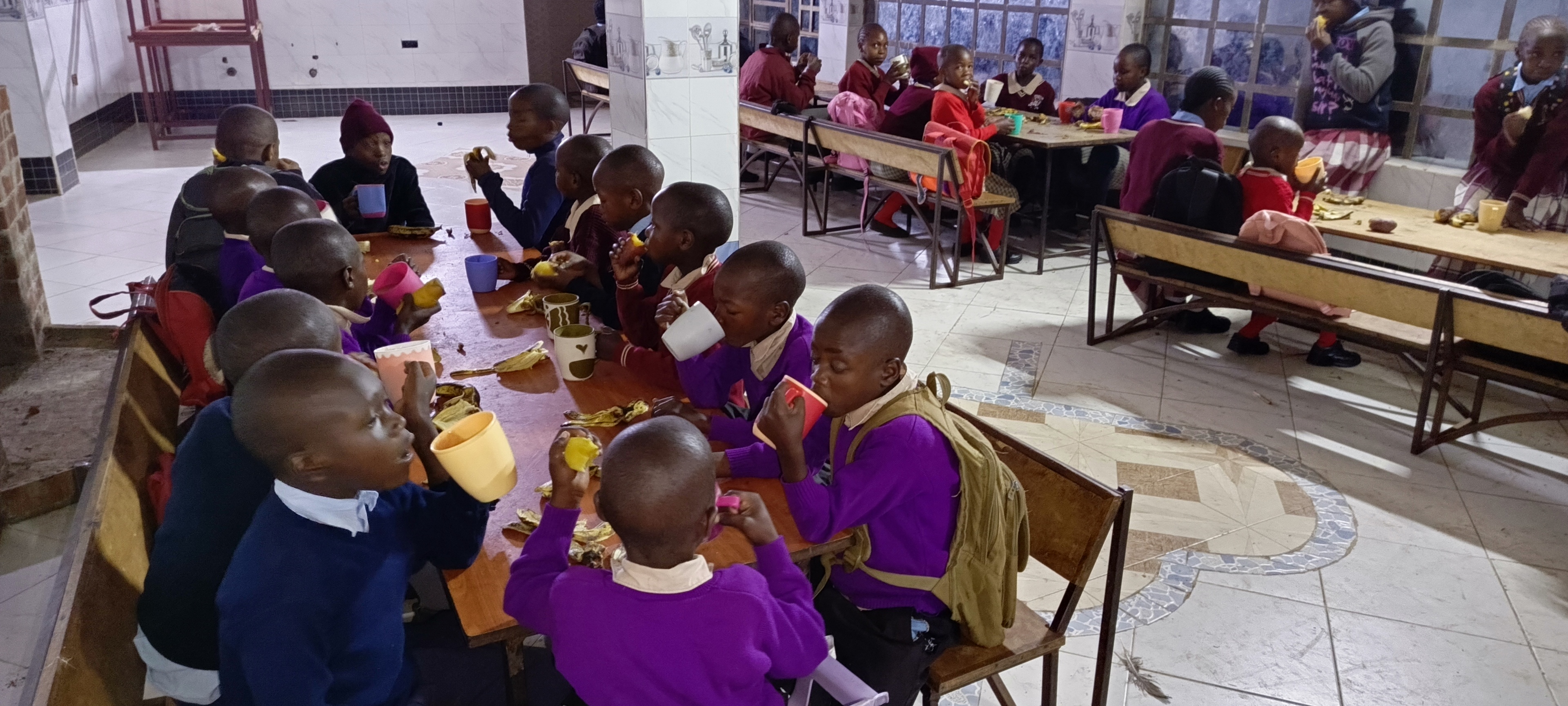Children eating breakfast at Bethesda Child Care Centre