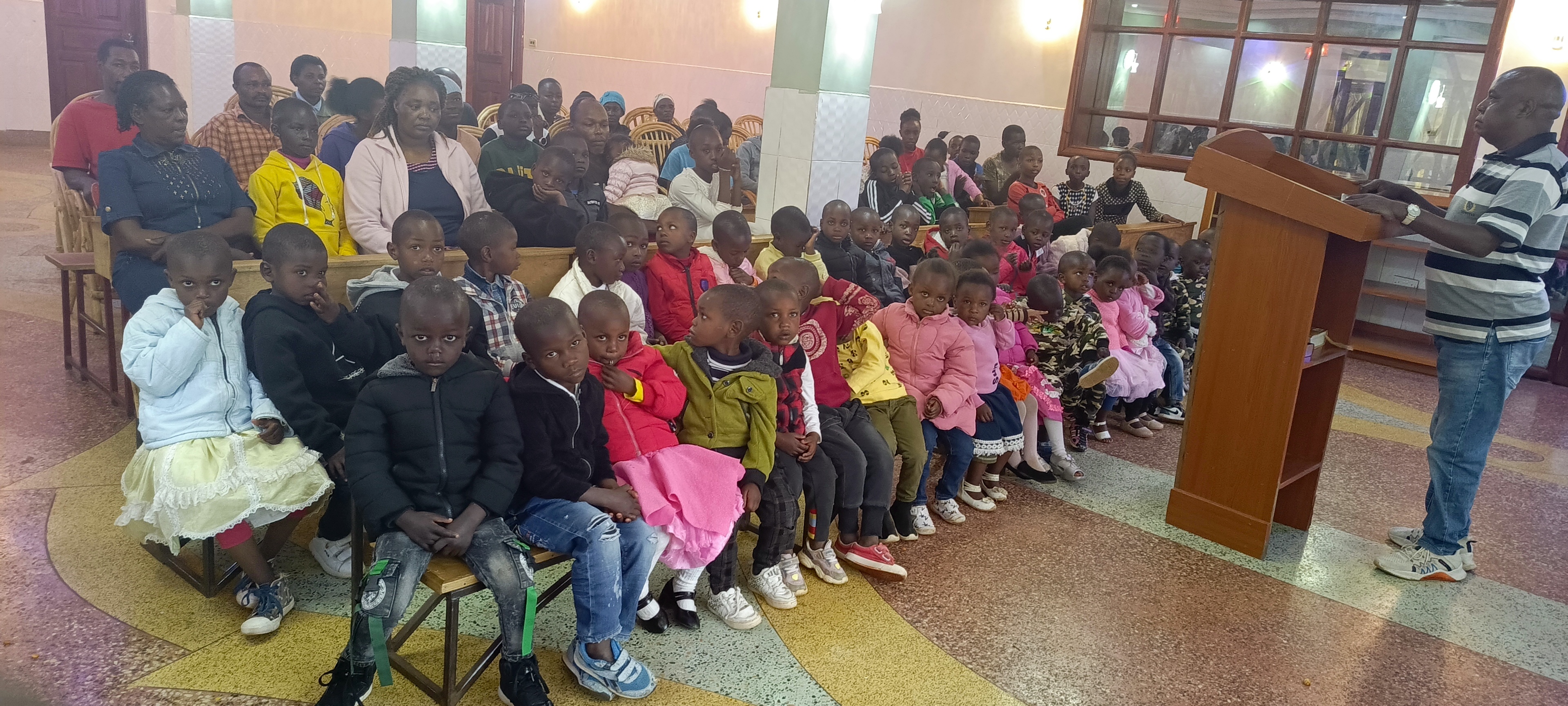 Children receiving spiritual guidance at Bethesda Child Care Centre