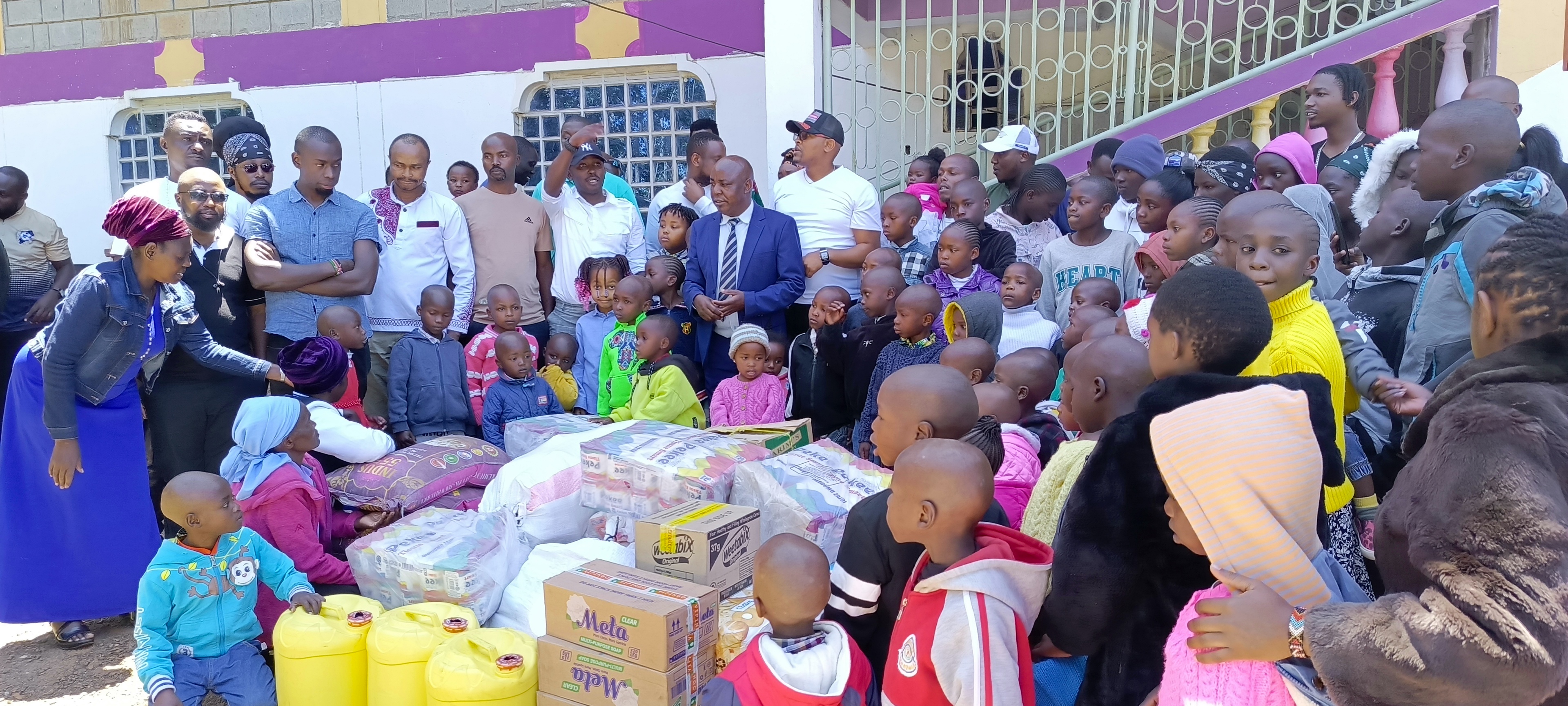 Visitors spending time with children at Bethesda Child Care Centre